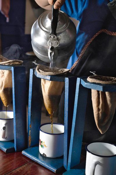 a chorreador set up with a coffee sock to make sock coffee