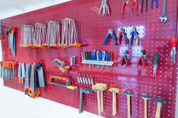 wall mounted pegboard system for workshop