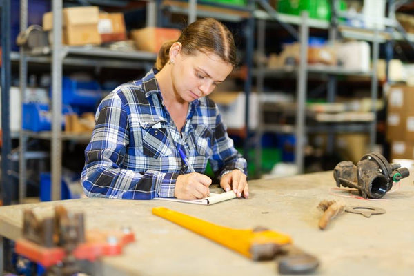 woman-sitting-at-workbench