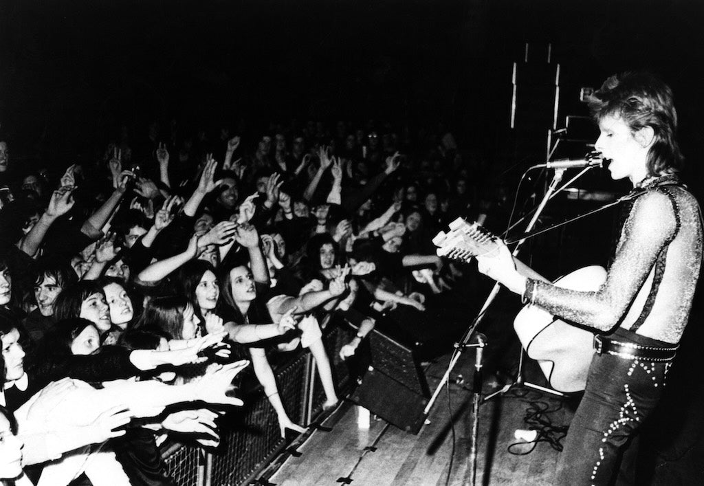 David Bowie performing as Ziggy Stardust