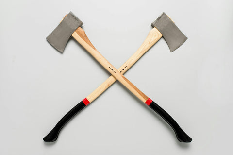 One thing to do in Leeds city centre is axe throwing, shown here by an image of two axes against a grey background