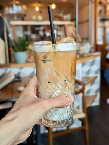 Iced latte in glass at House of Koko