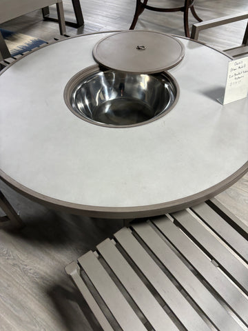 64" diameter Grey stone-top aluminum circular table, with silver icebucket inside of the center.
