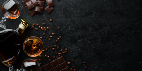 brandy and chocolate on blackboard