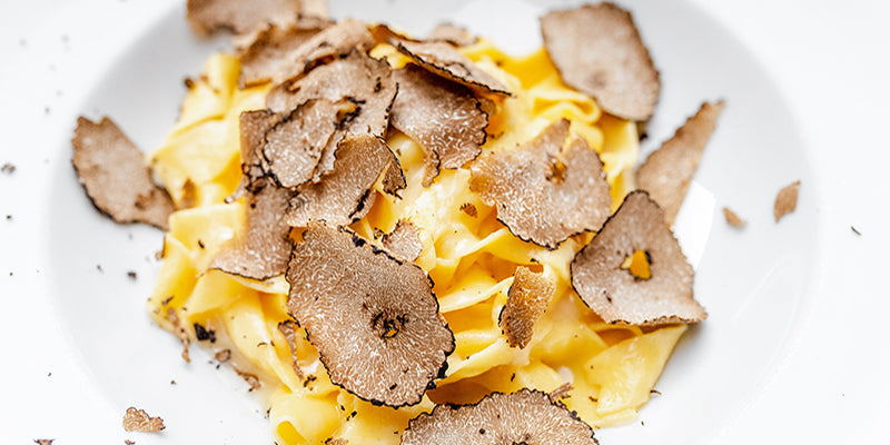 Pappardelle pasta with large truffle shavings