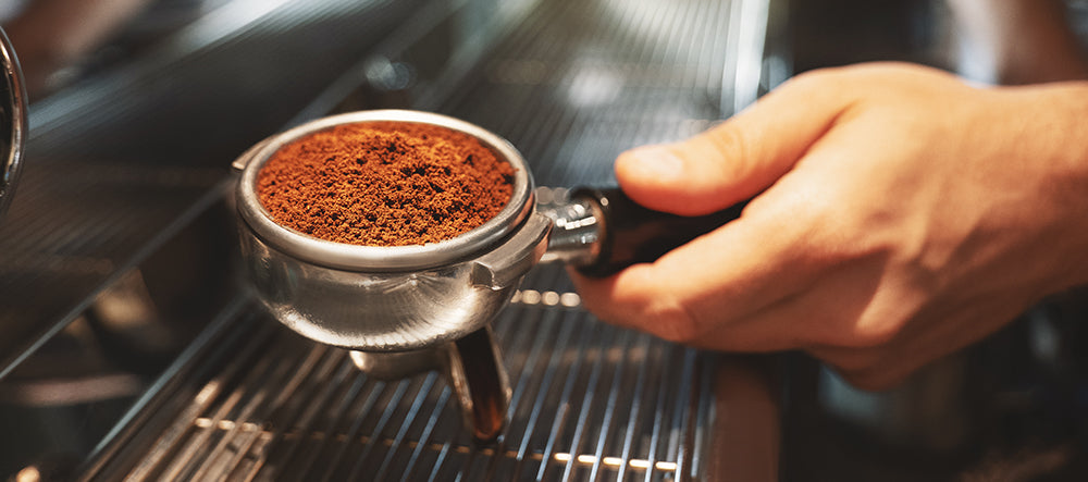 Ground espresso coffee in a portafilter