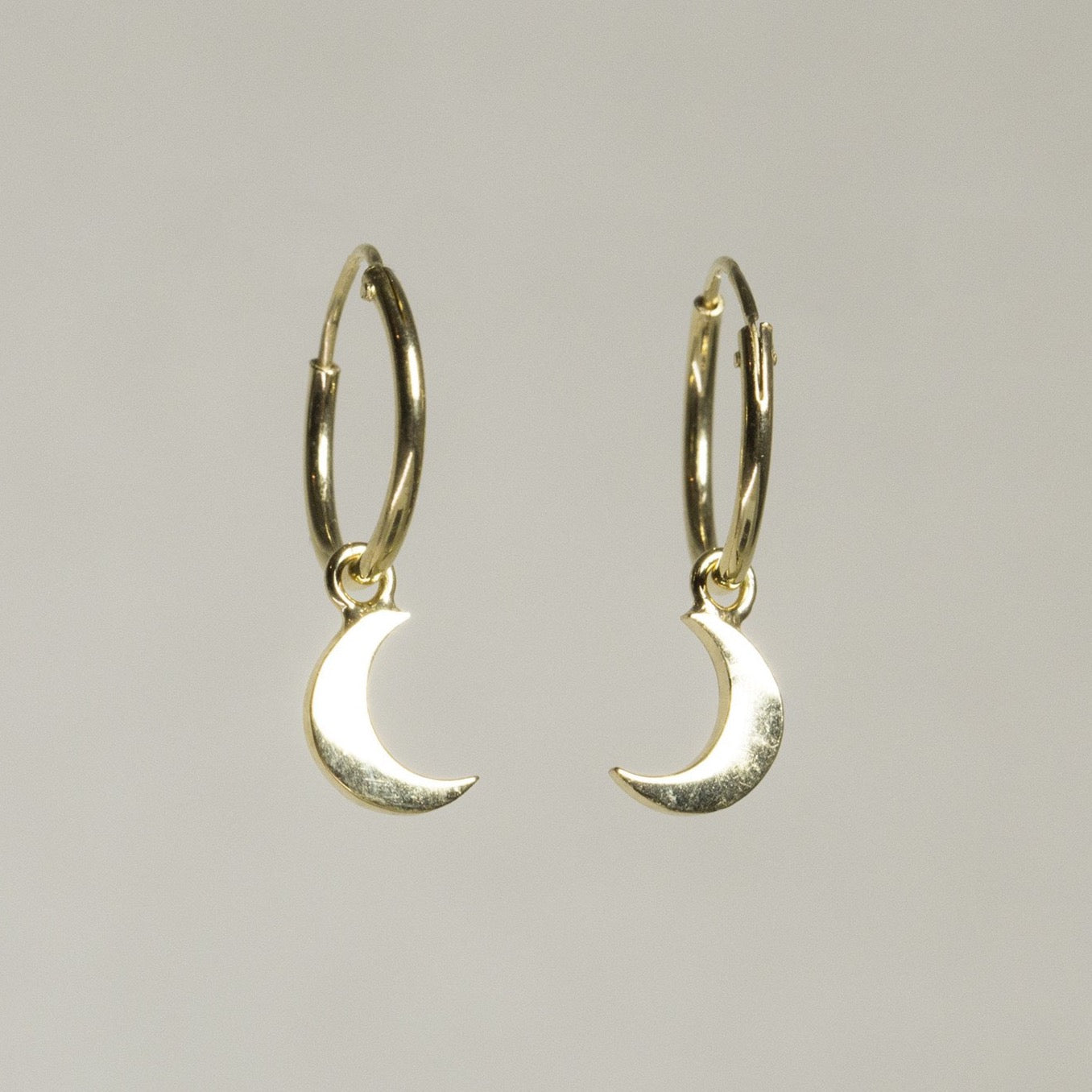 Laura Gravestock's Majestic Large Gold Plated Silver Hoop Earrings