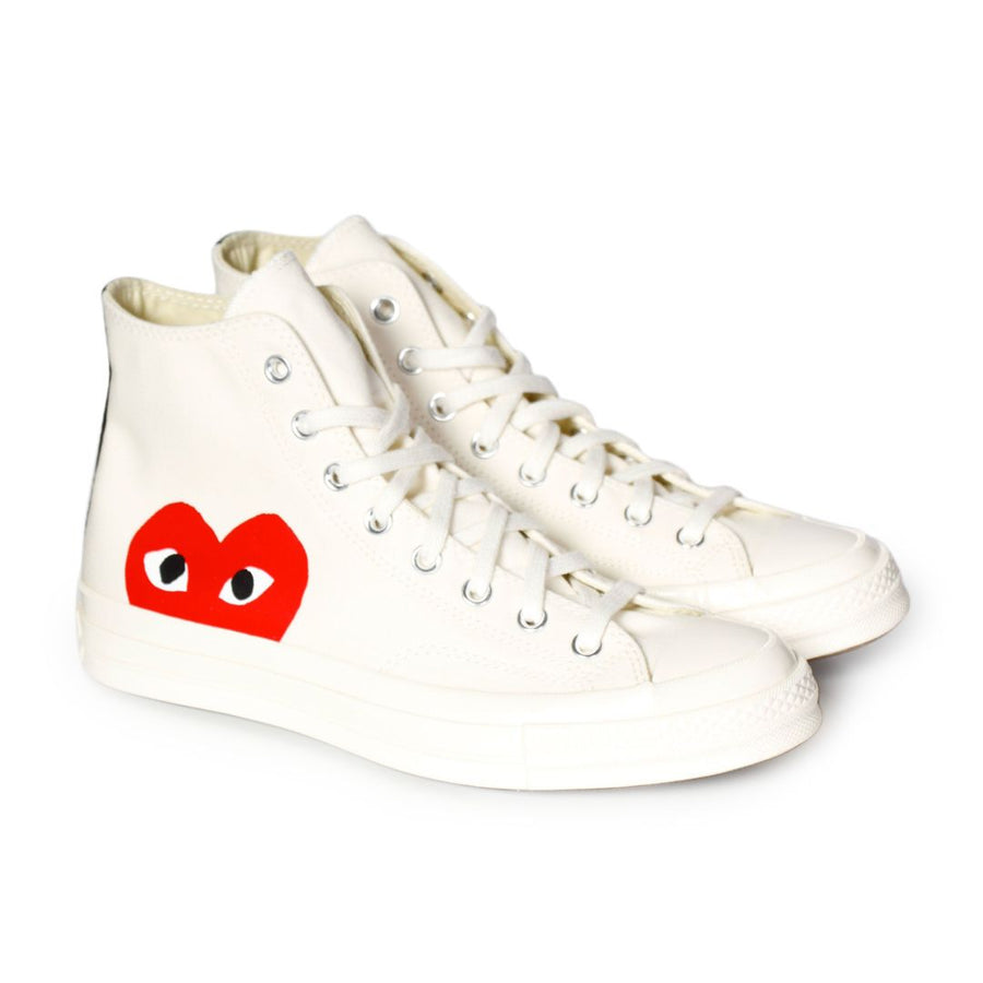 white high top converse with red heart