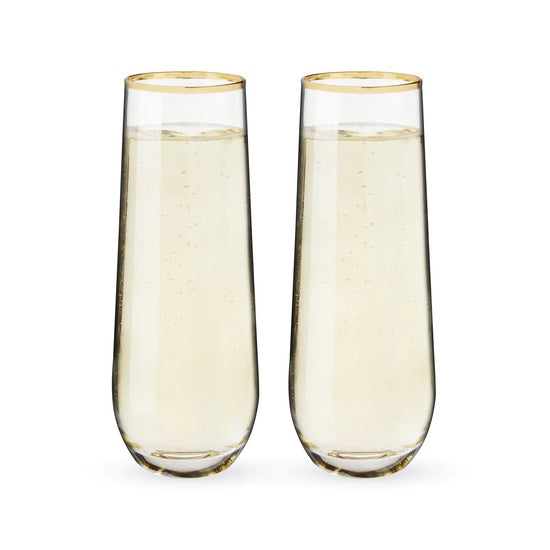 https://cdn.shopify.com/s/files/1/0275/1876/3088/products/gilded-stemless-champagne-flutes-set-of-2-175743_550x.webp?v=1684614296