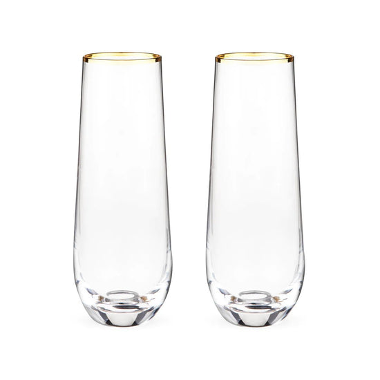 https://cdn.shopify.com/s/files/1/0275/1876/3088/products/gilded-stemless-champagne-flutes-set-of-2-822084_550x.webp?v=1684614296