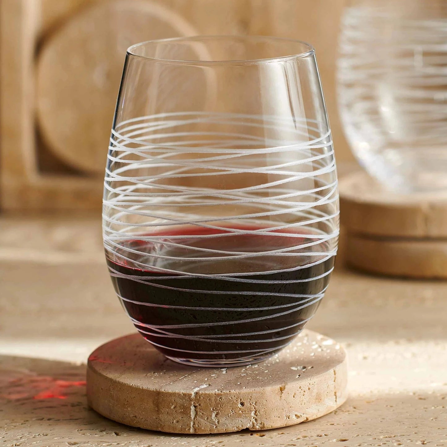 https://cdn.shopify.com/s/files/1/0275/1876/3088/products/solis-stemless-wine-glass-set-of-4-705086_1445x.webp?v=1675817762