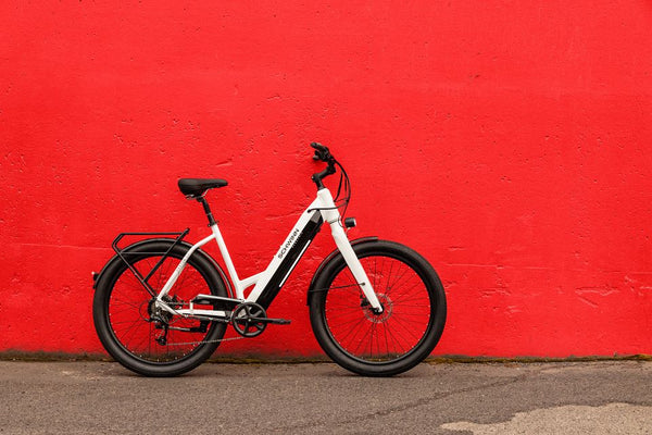 A white step-thru Coston DX electric bike for seniors