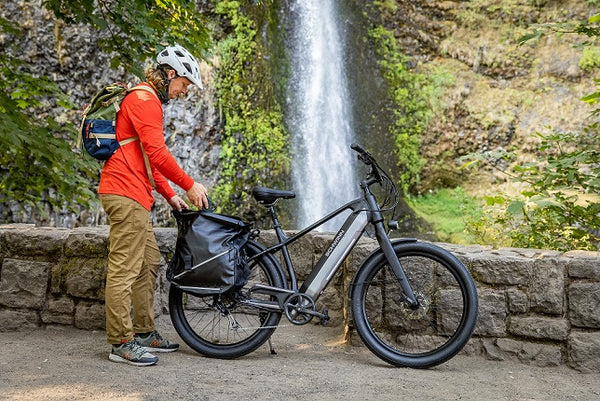 A person storing items on their bicycle