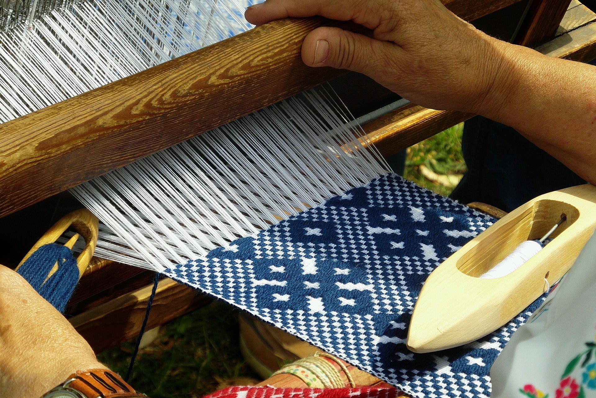 Image of a hand-crafted rug being made