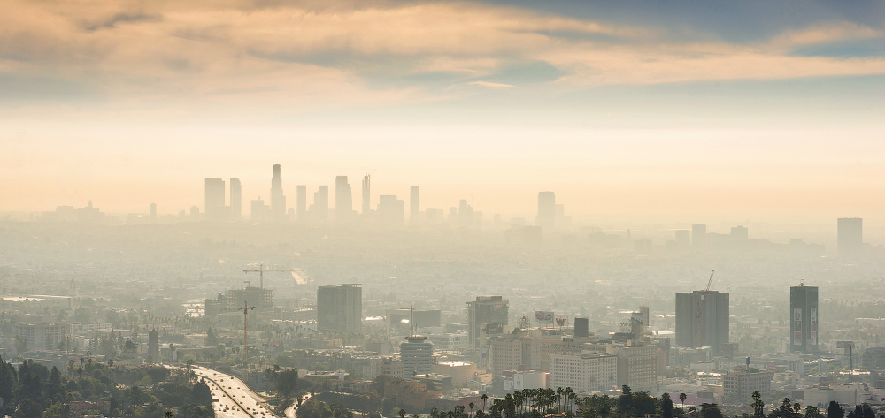 a smoggy downtown city causing chronic stress