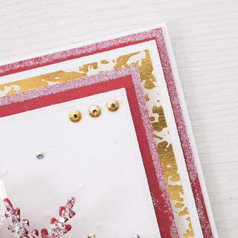 Learn how to create a festive Christmas garland card this Winter using products from Chloes creative cards during this free card making tutorial.