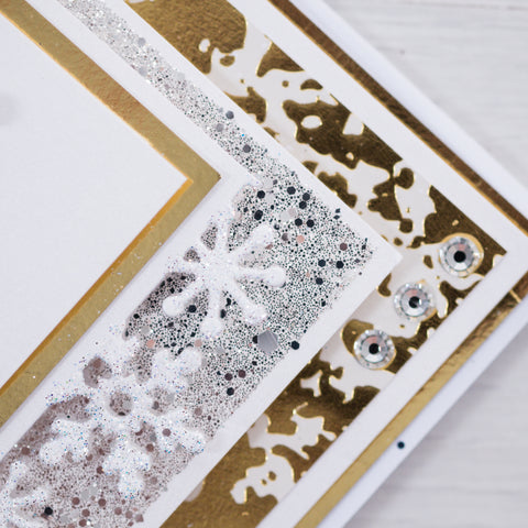 Learn how to create this silver and gold swirly snowflake Christmas card using products from Chloes Creative Cards. This free step-by-step tutorial shows you how to make a quick and easy Christmas card at home using our new Snowflake Stamp and Die Set.