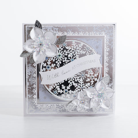 Learn how to create this magical silver snowflake Christmas card using our silver mirror card layered with our Snowflake Circle and Christmas Rose Stamps.