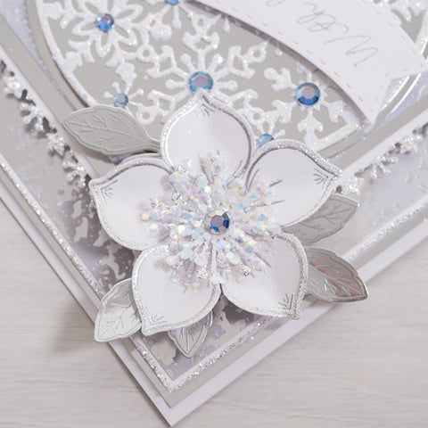 Learn how to create this magical silver snowflake Christmas card using our silver mirror card layered with our Snowflake Circle and Christmas Rose Stamps.