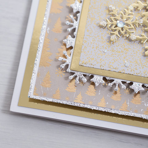 Create a beautiful gold mirror snowflake Christmas tree card using the new Snowflake Tree Metal Die Stamp from Chloes Creative Cards.