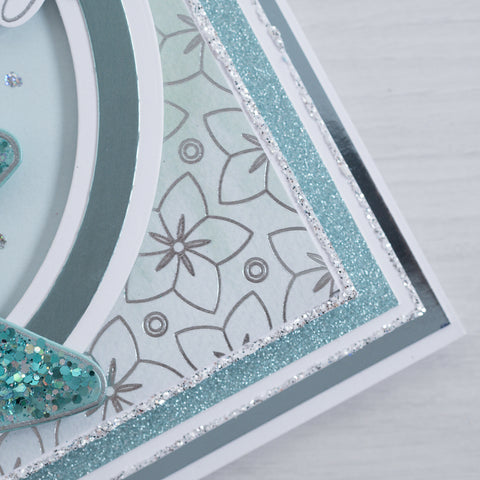 Learn how to make this beautiful blue and teal sparkling stiletto greetings card with this simple and easy tutorial from Chloes Creative Cards.