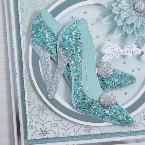 Learn how to make this beautiful blue and teal sparkling stiletto greetings card with this simple and easy tutorial from Chloes Creative Cards.