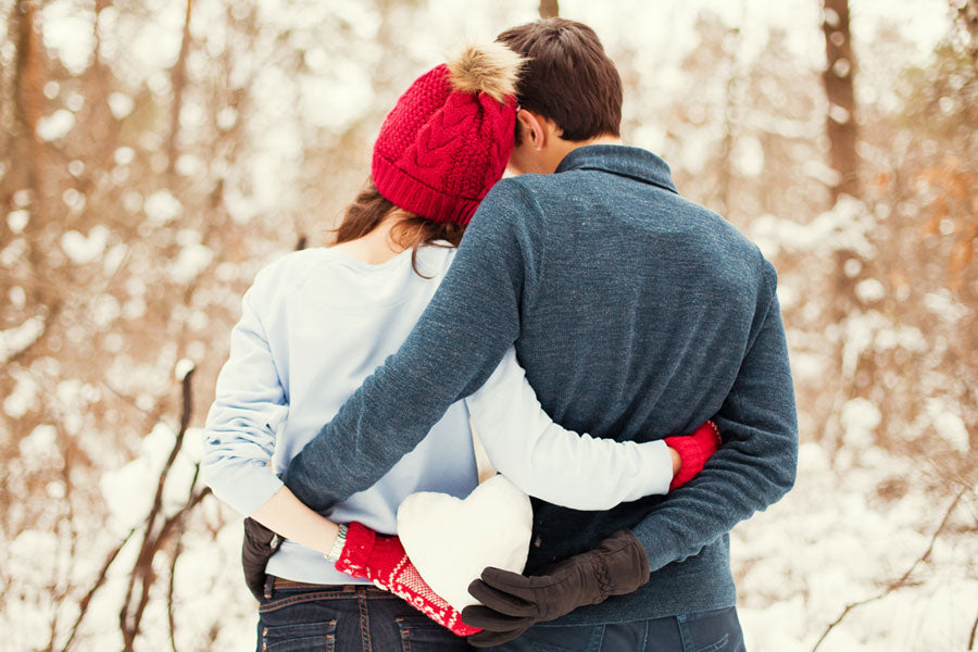 young man and woman in snow, holding heart, college crush erotic story