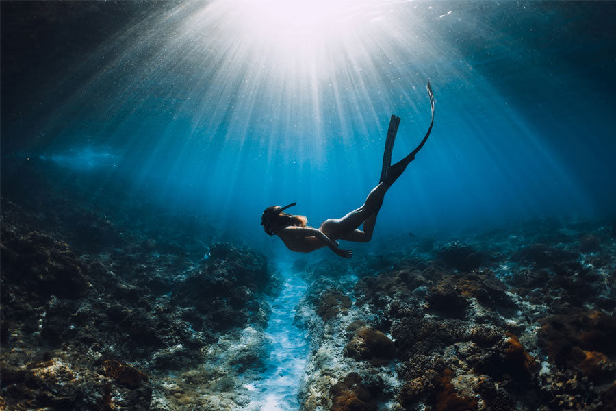 woman scuba diving in ocean, diving sex story
