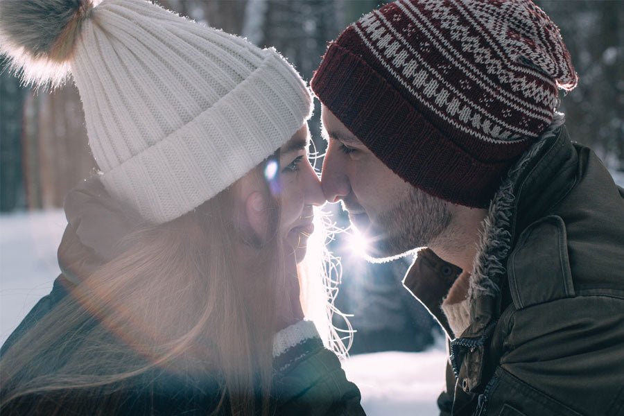 man and woman kissing in snow, erotic story, ski lodge vacation