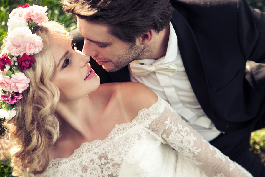 bride and groom looking at one another, mail order bride story