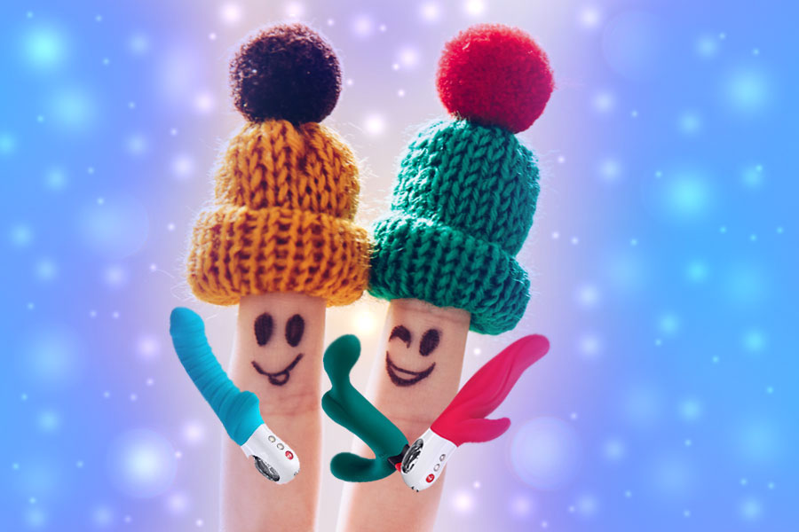 finger puppets with winter hats on holding sex toys for the holidays