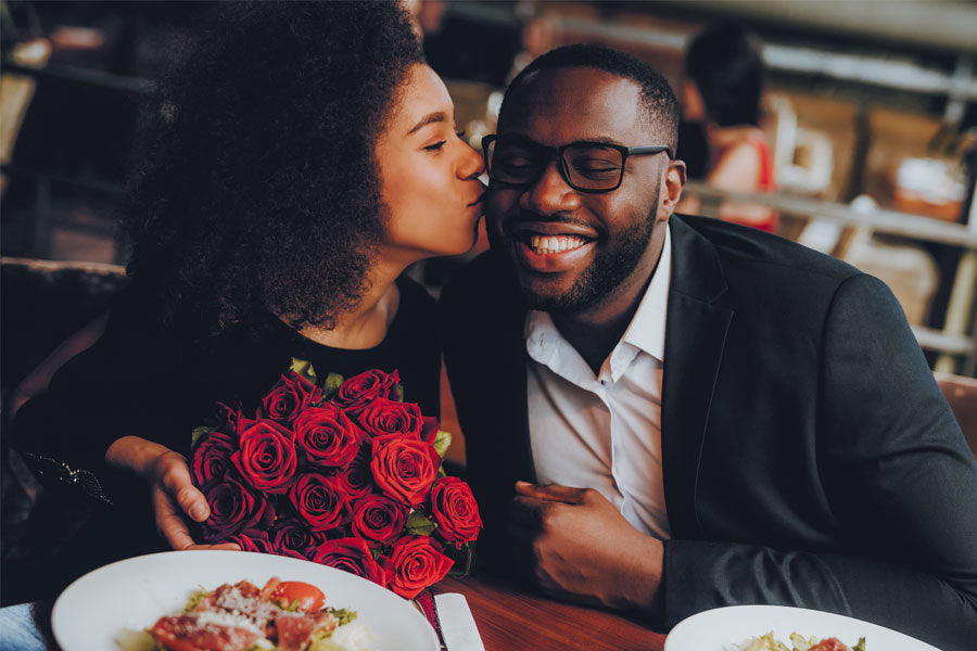 black man, black woman at table kiss on cheek, table sex story