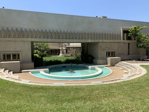 Circular fountain outside Hollyhock House with a view to the interior courtyard