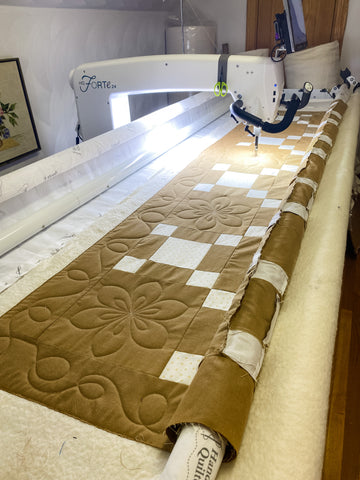Longarm machine top quilting the nine patch brown and white quilt