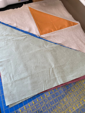 cotton/linen fabric cut to create a finished square