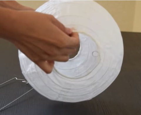 Expanding a paper lantern