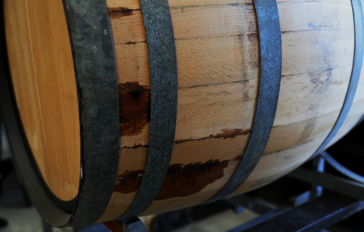 25 year old oak barrels from the Barossa Valley are used to age and mature Original Spirit Co.'s Harvest Blend EXQ