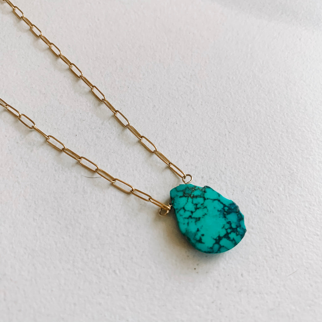 turquoise squash blossom necklace meaning