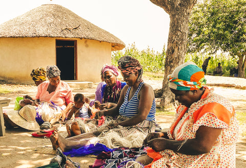 master weavers from eswatini waving sisal wall baskets