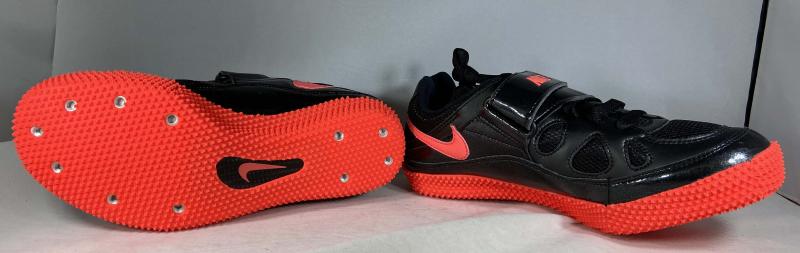 red and black track spikes