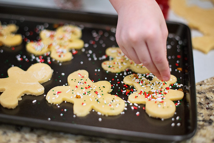 Fresh baked sugar cookies on a pan.