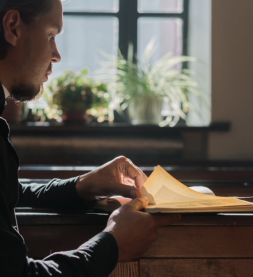 A pastor reading his Bible.