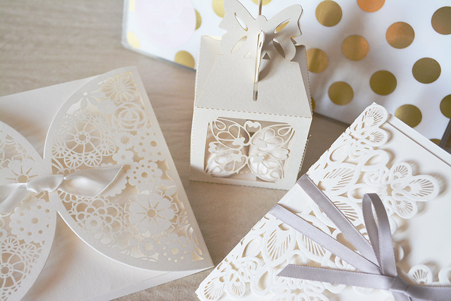 Attractive lacey white invitations.