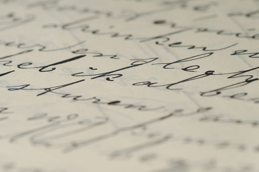 Close up of a document with beautiful handwriting.