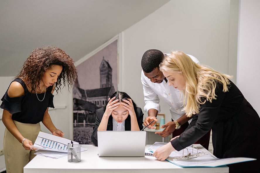 A group of employees struggling with how to respond to their customers