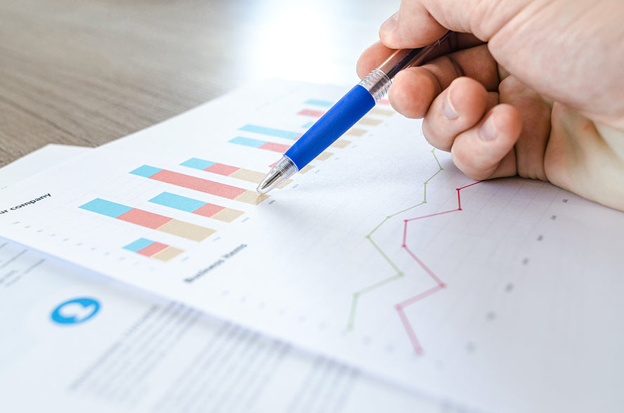 Charts and graphs showing sales figures.