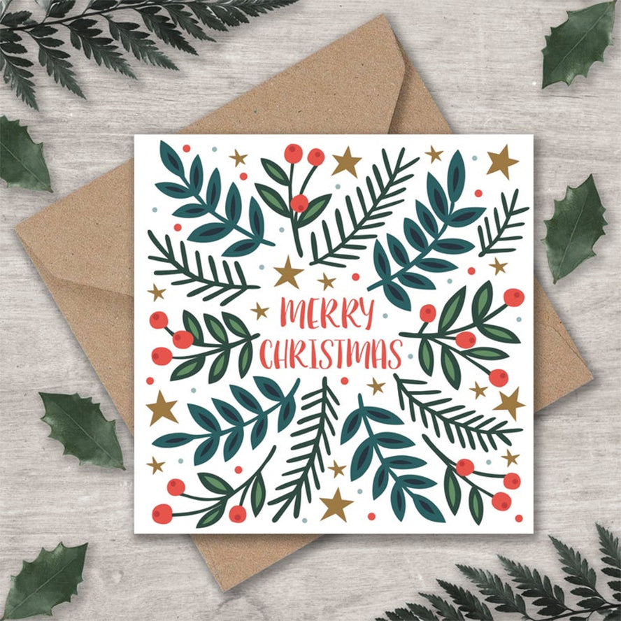 A Christmas card with holly berries and stars.