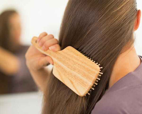 Appropriate brushing of your hair- No to Dandruff