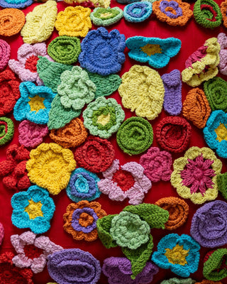 https://cdn.shopify.com/s/files/1/0275/7790/9383/products/poppy-organic-cotton-abstract-crochet-throw-pillow-148254.jpg?v=1694249959&width=320