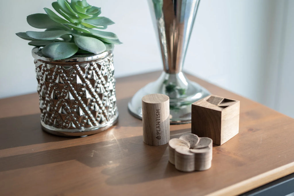 Three different wooden diffusers on a wooden table
